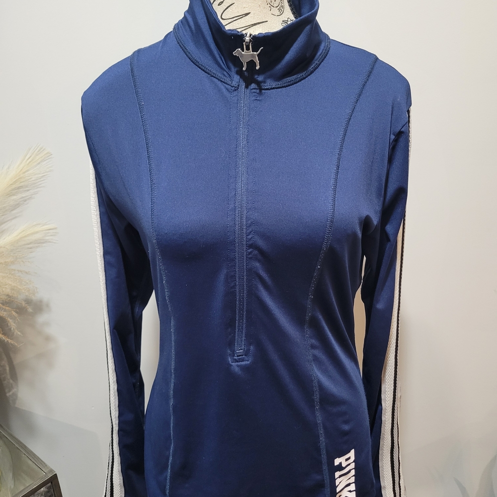 Victoria's Secret PINK half-zip navy blue with white and black striped sleeves.